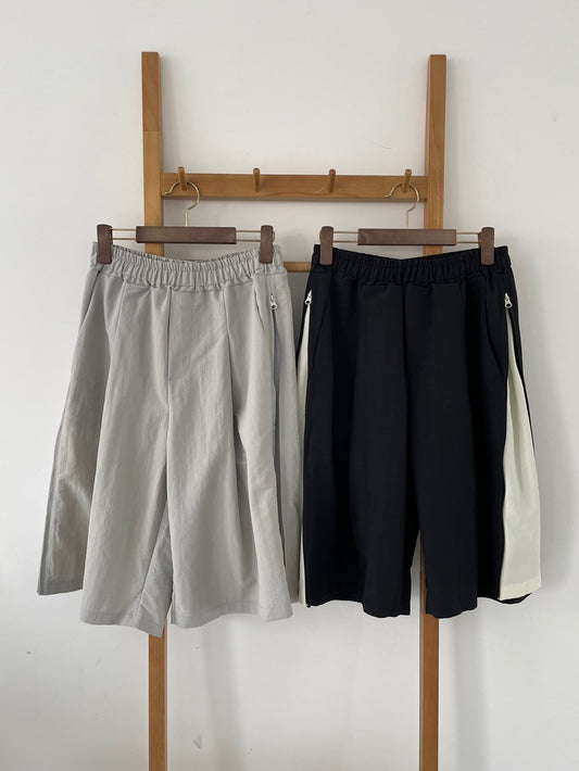 Side zip-up shorts