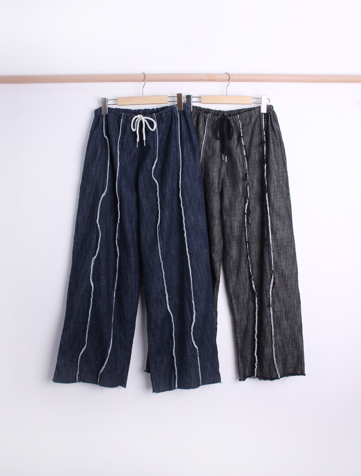 Distressed string denim pants