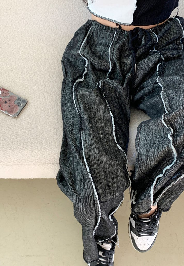 Distressed string denim pants