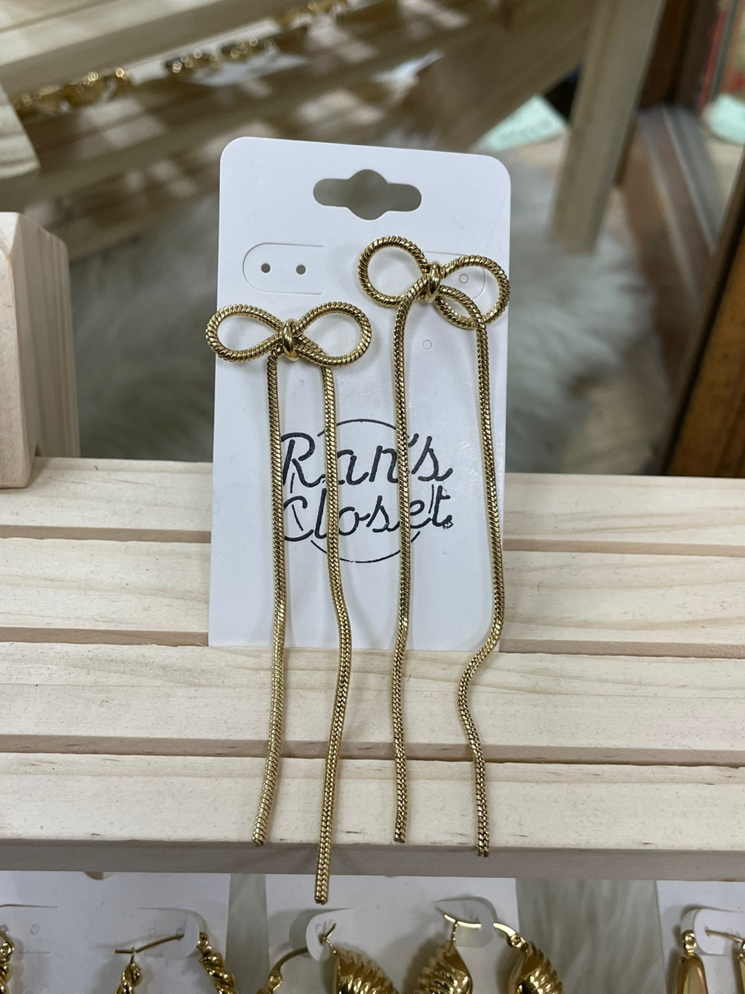 Gold Dangly Bow Earrings