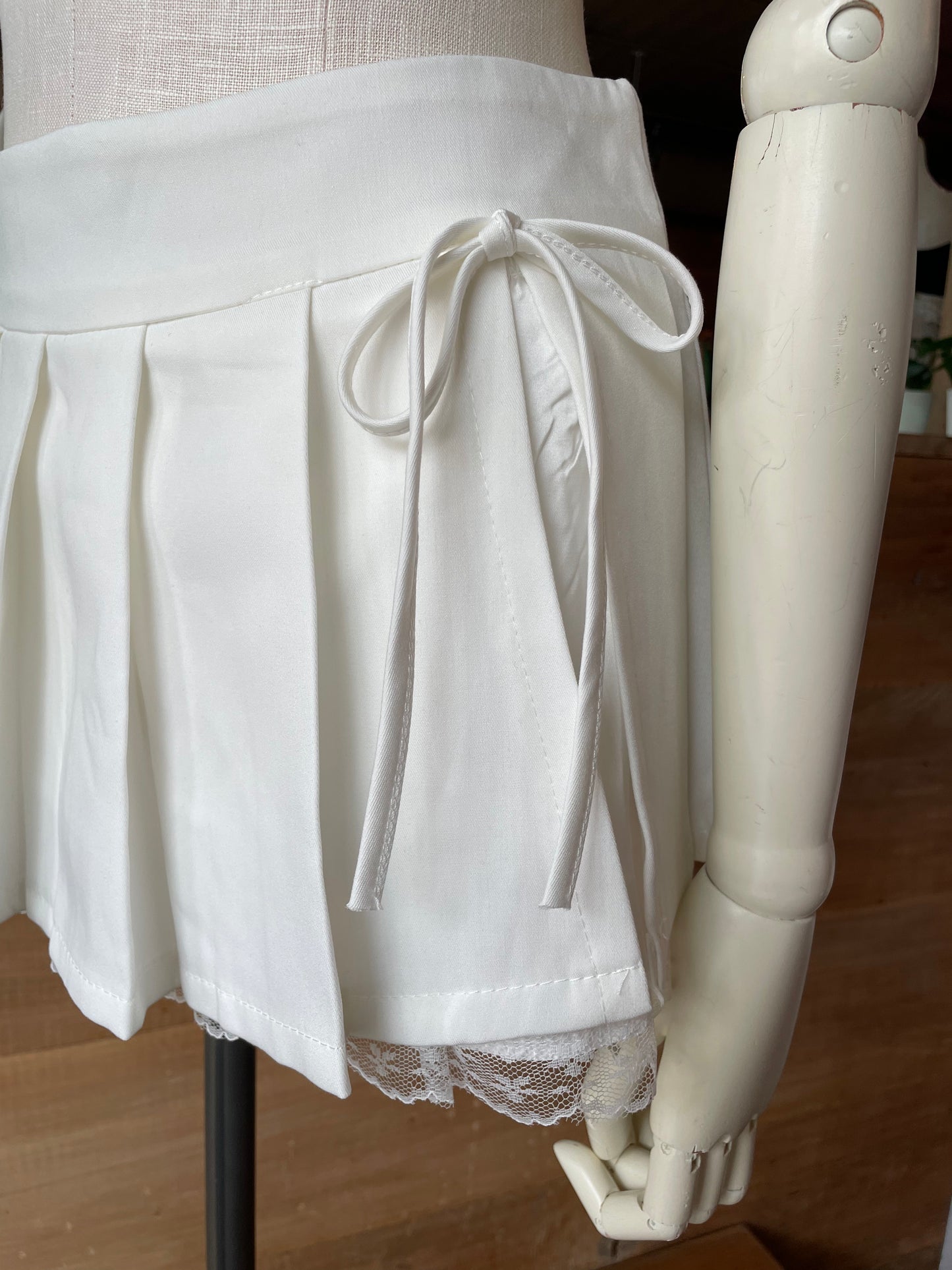 Pleated Mini Skirt with Bow