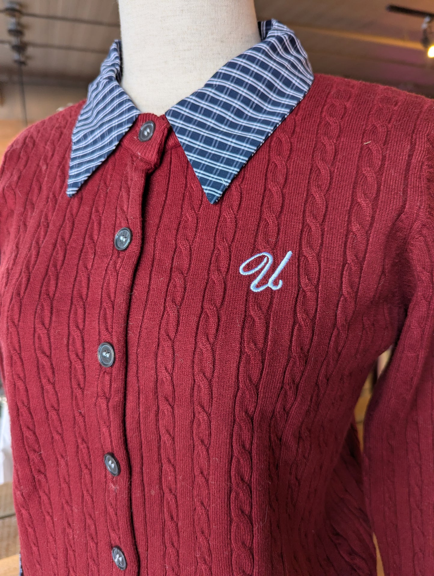 "U' Embroidered Cable Knit Cardigan with Plaid detail