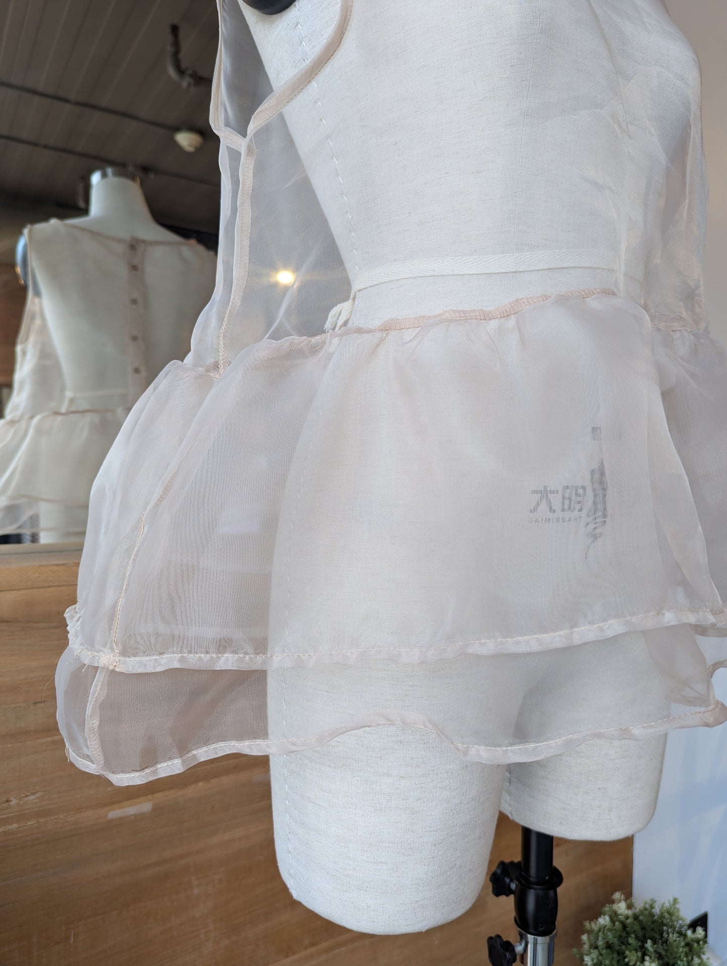 Cloud Ruffle Peplum Top