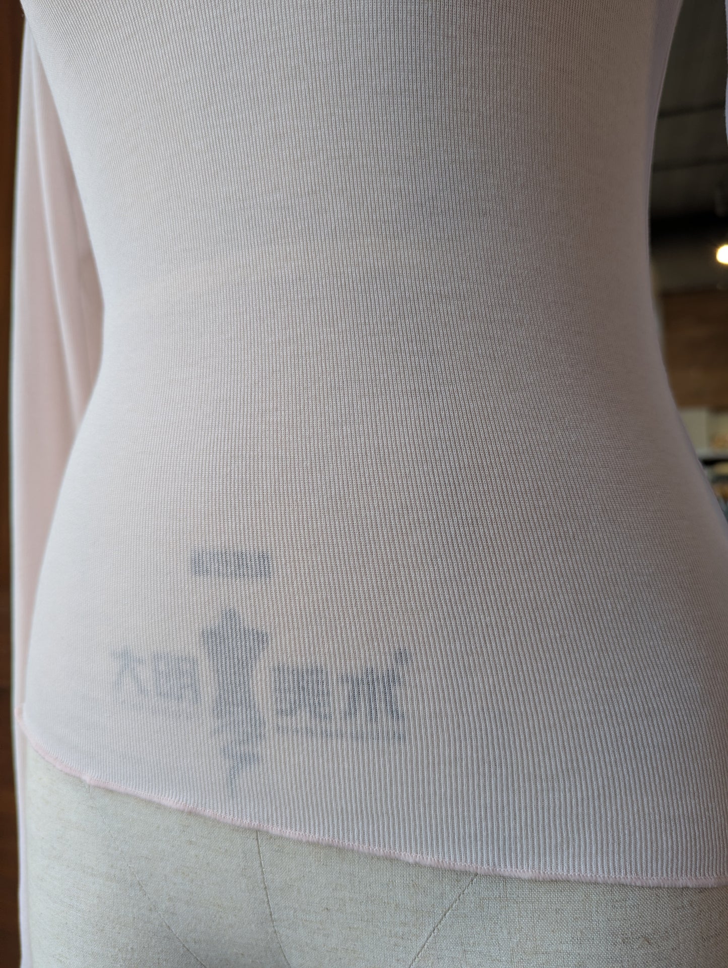 Sheer Soft Twist Lettuce Hem Top