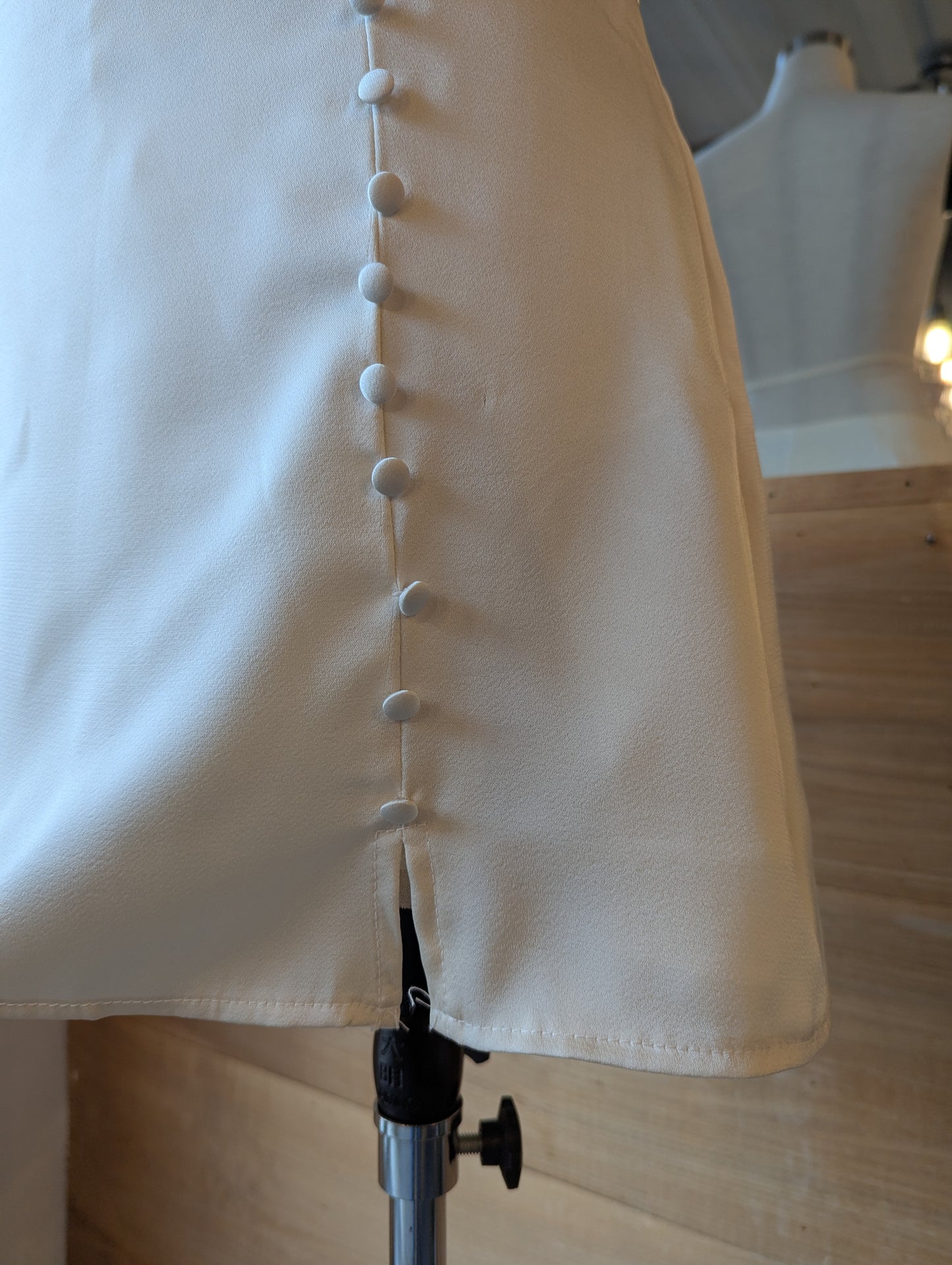 Pearl Faux Button Mini Skirt