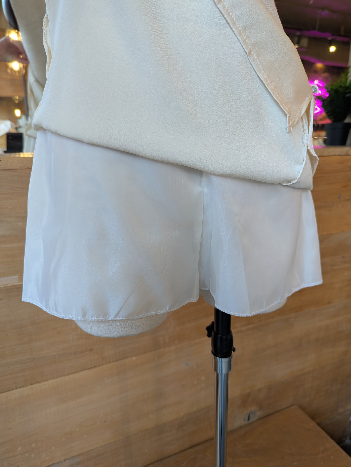 Pearl Faux Button Mini Skirt