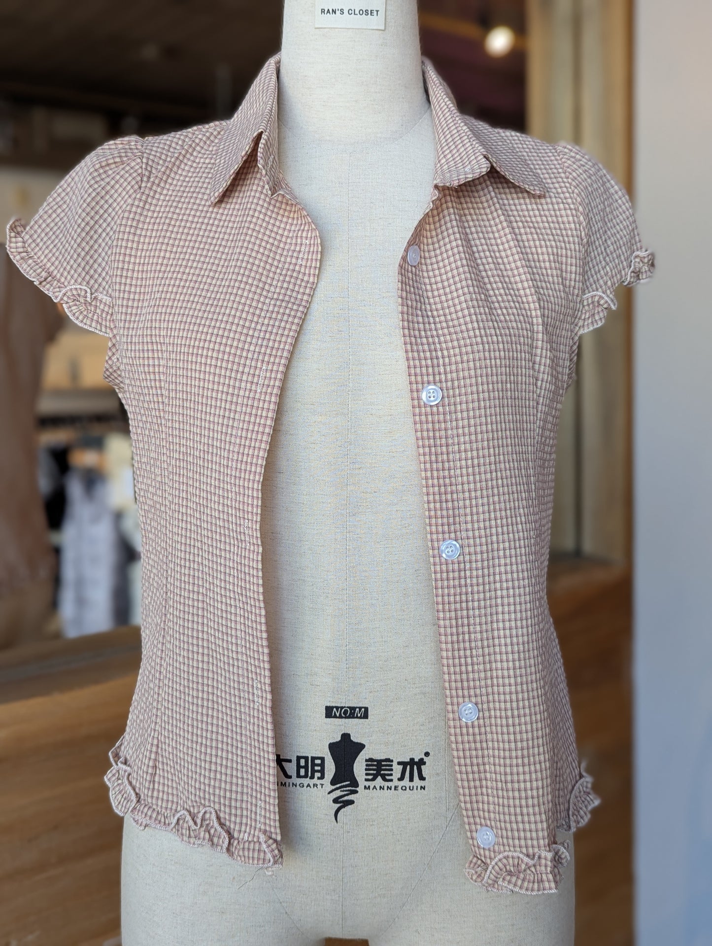 Balmy Plaid Ruffle Hem Button Down