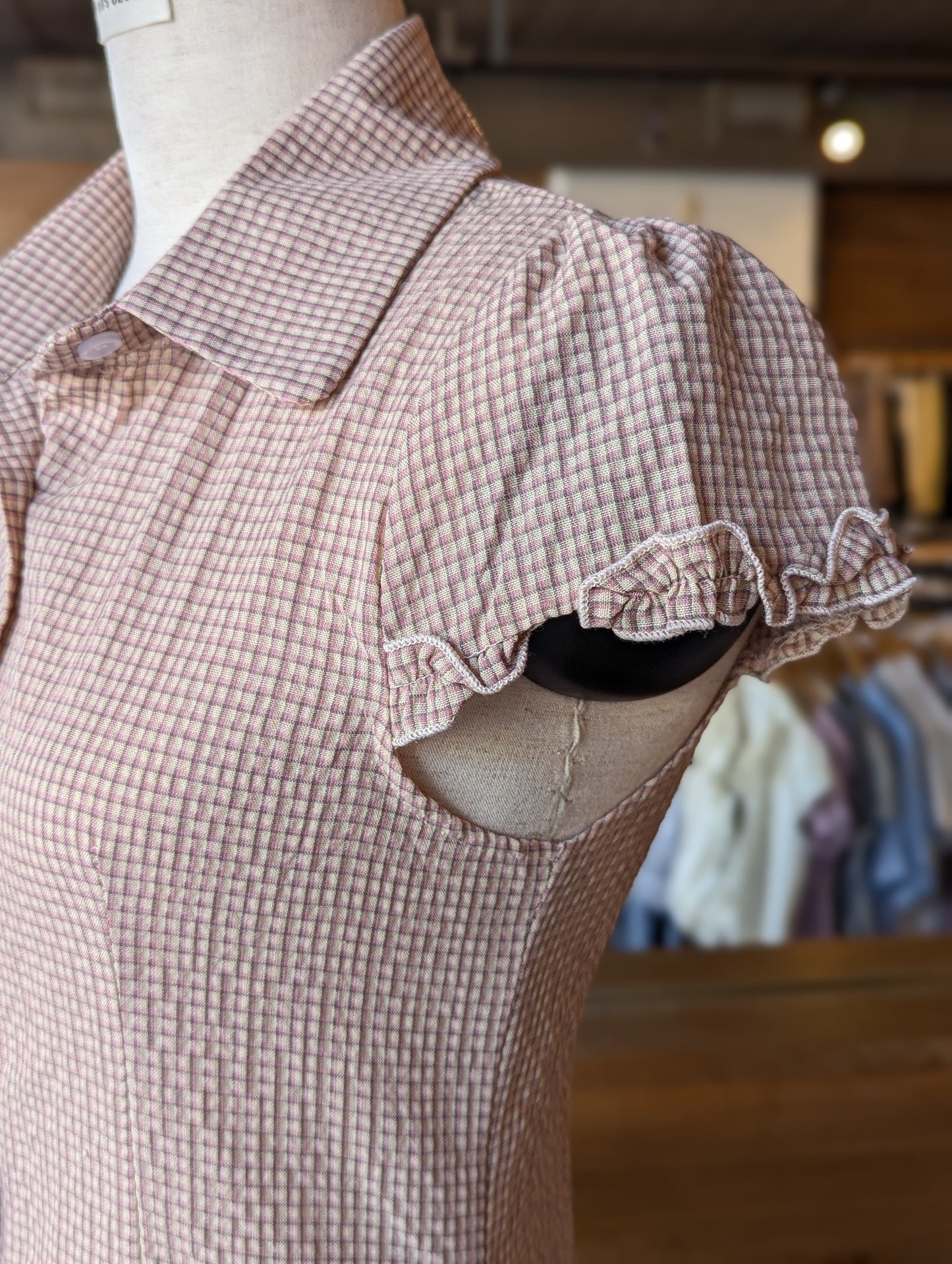 Balmy Plaid Ruffle Hem Button Down