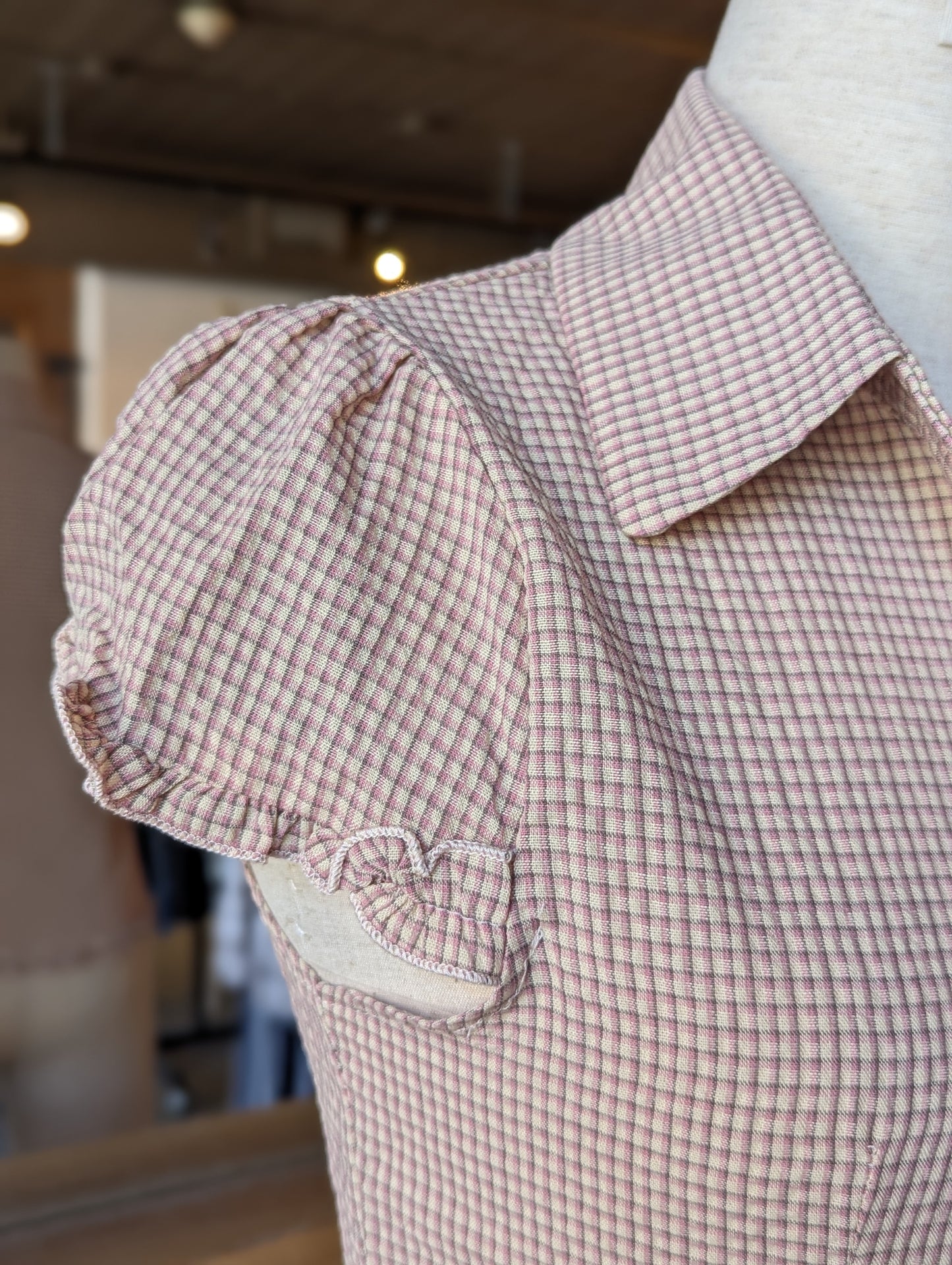 Balmy Plaid Ruffle Hem Button Down