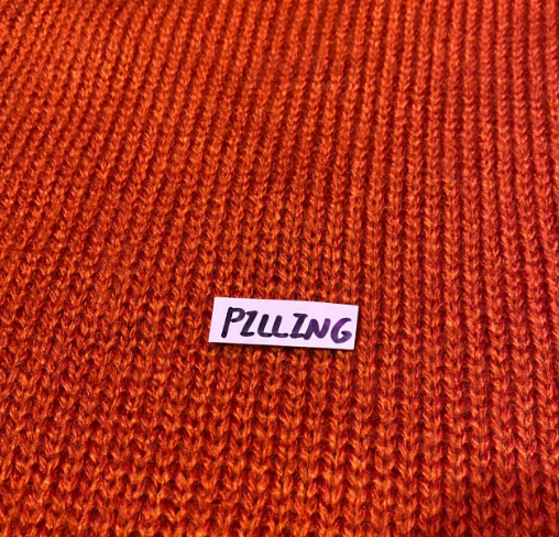 Vintage Orange Knit Sweater with Flower Design