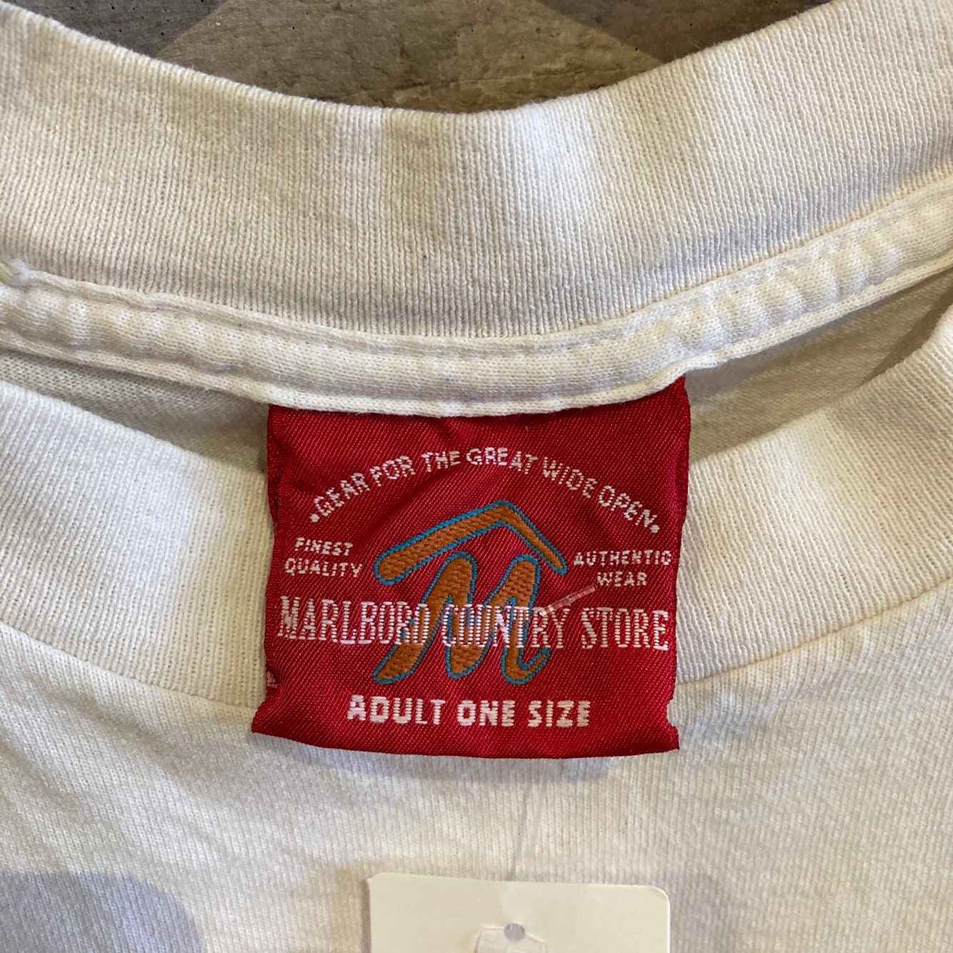 Vintage White Marlboro T-shirt with Large Graphic Print | Vintage Graphic T-shirt | Marlboro Country Store | Men's One Size | SKU: NPQ-2096